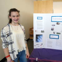 <p>John Jay Middle School eighth-grade student Ashley Stagnari received an award for her project “Salmon’s Big Hit” at the school’s science fair.</p>