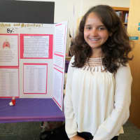 <p>John Jay Middle School seventh-grade student Kaitlyn Machado received an award for her project “Asthma and Activities” at the school’s science fair.</p>