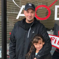 <p>Hasbrouck Heights coach John Valenti and his daughter Gianna say good bye to Overdrive Training in Wood-Ridge.</p>