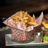 <p>Burger and fries at Johnny Utah&#x27;s in South Norwalk.</p>