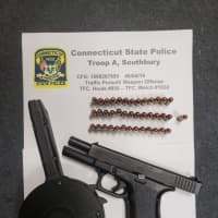 <p>The gun and ammunition recovered.</p>
