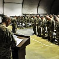 <p>Service members paid their respects during a fallen comrade ceremony at Bagram Air Field, in Afghanistan, on Dec. 23. Joseph Lemm was one of six airmen killed in a Dec. 21 suicide bombing.</p>