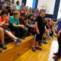 <p>Katonah Elementary School student Gerard Garofolo speaks about being a champion during a visit from &quot;The NED Show.&quot;</p>