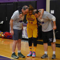 <p>A member of the Harlem Wizards has a conference with the refs.</p>