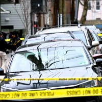 <p>Investigators at the scene of the March 9 homicide on Jordan Avenue off Mercer Street near McGinley Square in Jersey City.</p>