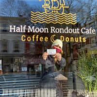 <p>Owner Kaira Tiegen in the window of Kingston&#x27;s new Half Moon Rondout Cafe</p>