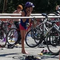 <p>Kara Wilczynski, 12, gets ready for the biking leg of her first triathlon.</p>