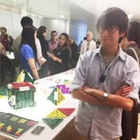 <p>Ken Augushi with his creative mazes at the Parsons School of Design where he presented his thesis show.</p>