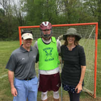 <p>Kern Byrnes, who was named US Lacrosse All-American, pictured with his parents.</p>