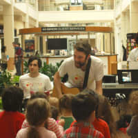<p>Kids are encouraged to play the band&#x27;s instruments – drums, guitar, and keyboard – during a class.</p>