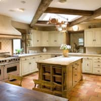 <p>The home&#x27;s kitchen includes modern amenities for any casual cook.</p>