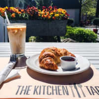 <p>Iced latte and a chocolate croissant at The Kitchen Table in Pound Ridge.</p>