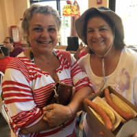 <p>Margot Dinkjian of Fort Lee and Diane Tavition of Waldwick picked up hot dogs before heading to the beach</p>