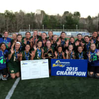 <p>The Lakeland High School field hockey team poses with its title banner.</p>