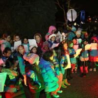 <p>Leonia children turned out for hot chocolate, lighting the tree and Santa arriving on a fire truck.</p>