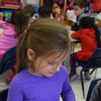 <p>Daniel Warren Elementary School kindergartners explored their five senses with scientist Christopher Stetson during the interactive “Let’s Make Sense” program, which was generously funded by the PTSA.</p>