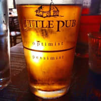 <p>Little Pub, which has four locations, shows its sense of humor with its optimist-pessimist glasses.</p>