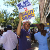 <p>Union members picketed outside New York-Presbyterian/Lawrence Hospital.</p>