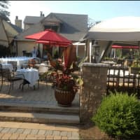 <p>Greenery, plants and stonework make for a scenic place to relax and enjoy fine Italian cuisine outdoors at Locale Cafe and Bar in Closter.</p>