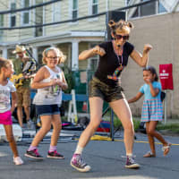 <p>Jill Liflander, who also did a puppet show at the event, led kids in a slow-motion Olympic run, set to &quot;Chariots of Fire.&quot;</p>