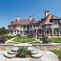 <p>Douglas VanderHorn’s award-winning 10,400-square-foot French Eclectic home, is a beautiful waterfront sanctuary surrounded by evergreens and opening toward Long Island Sound.</p>