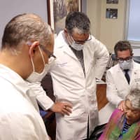 <p>Lenox Hill physicians (from left) Dr. Rafael Ortiz, Dr. David Langer and Dr. John Boockvar with De La Villa.</p>
