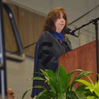 <p>Lorrie Rodrigue, Newtown High School Principal, speaks at the graduation ceremony on Saturday.</p>