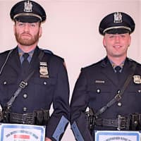 <p>Officers Kyle Monton (left), Michael Karcher</p>