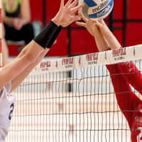 <p>Hopewell Junction&#x27;s Megan Theiller, a graduate of John Jay, extends to block a ball during a volleyball game. She is a junior at Fairfield University.</p>