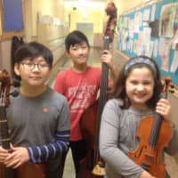 <p>Main Street School All-County Orchestra include, from left, Seungchan Yun, Ryan Liu and Julianne Korb.</p>