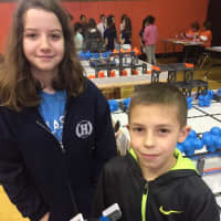 <p>Left to right: Harvey School students Wendy Lichtenberg and Clayton Collum. The students are in a middle school robotics program.</p>