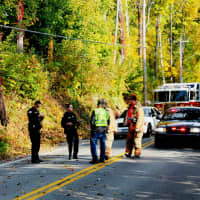<p>Emergency responders at the scene of the crash.</p>