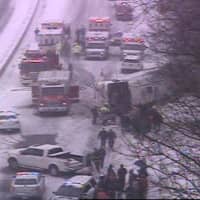 <p>A charter bus has rolled over on northbound I-95 near Exit 61 in Madison, east of New Haven.</p>