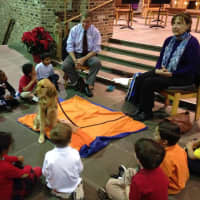 <p>Kindergartners and first-graders at The Chapel School in Bronxville meet Maggie the Comfort Dog and her handler.</p>