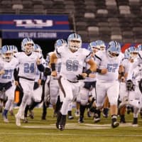 <p>At the homecoming game on Friday, the state champion Mahwah High School football team will be accompanied by children with disabilities.</p>