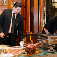 <p>Marcelo de Carvalho prepares presunto and other offerings from Solar do Minho at last year&#x27;s Taste of Essex.</p>