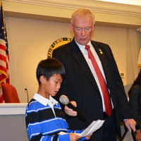 <p>Mayor John Cosgrove helps David Rosenblum share his own story of a congenital heart defect at the late-January council meeting, at which the mayor announced the borough&#x27;s observance of Congenital Heart Defect Awareness Week.</p>