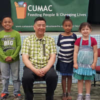 <p>Mel Hioki children at the Hackensack United Methodist Church book reading, organized by CUMAC.</p>