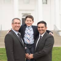 <p>Merlo Weiss, right, with his husband and 9-year-old son.</p>