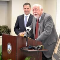 <p>Dutchess County Executive Marcus J. Molinaro, left, listens while Dr. Kenneth M. Glatt, former longtime commissioner of mental hygiene, speaks at the grand opening of the county&#x27;s stabilization center on North Road.</p>