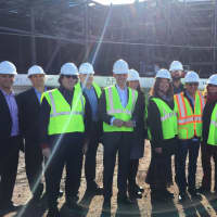 <p>Construction workers and executives banded together to celebrate a &quot;topping off&quot; ceremony, as the last steel beam on the Montreign Casino and Resort was put into place.</p>