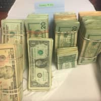 <p>Counterfeit bills recovered at the scene</p>