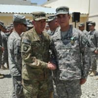 <p>Army Sgt. James Morrison of Wesley Hills is shown with Gen. David H. Petraeus, then the U.S. military commander in Afghanistan. In 2011, Petraeus cited the Rockland native for heroism.</p>