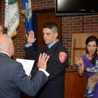 <p>Ted Mourges is sworn in as a lieutenant in the Danbury Fire Department</p>