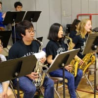 <p>The High School Jazz Band performing</p>