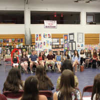<p>An Eastchester High student speaks at the National Art Honor Society induction ceremony.</p>