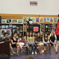 <p>An Eastchester High student speaks at the National Art Honor Society induction ceremony.</p>