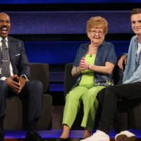 <p>Shelton resident Lillian Droniak, center, and her grandson, Kevin Droniak of Newtown, will appear on NBC&#x27;s &quot;Little Big Shots: Forever Young&quot; with Steve Harvey, left, on Wednesday, July 5.</p>