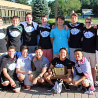 <p>Coach Sam Puso and the Group C state champion boys swim team of Northern Valley/Demarest</p>