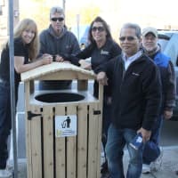 <p>Taking a break from installing the new trash can corrals in Nanuet recently are, from left: Chamber president Risa Hoag, member Nicholas Miller, who made the corrals; Chamber secretary Susan Farese, member George Mollo and past president Tim Chhim.</p>